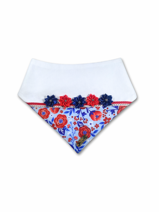 Memorial Day floral dog bandana, featuring a vibrant print with red, white, and blue blooms. This bandana is the perfect way to add a touch of patriotic style to your pup's wardrobe and celebrate the holiday in style.
